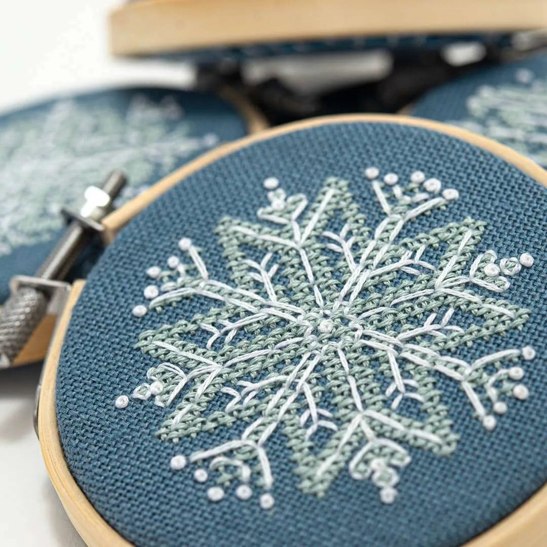 Mini Snowflake Ornaments Cross Stitch Pattern by Counting Puddles - Sewfinity.com
